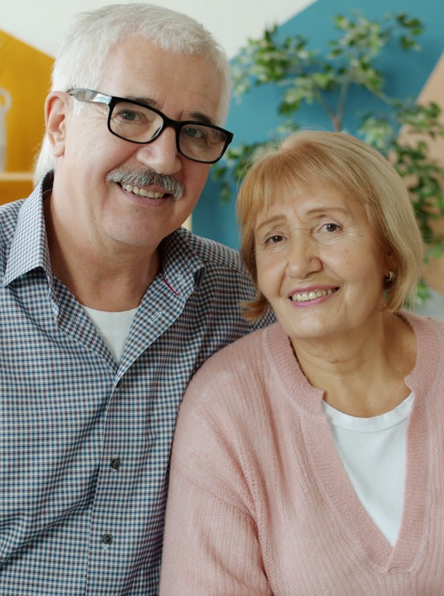 A smiling couple at home